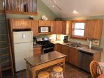 Kitchen with Full Fridge, Microwave, Dishwasher, Oven & Stove and Coffee Pot